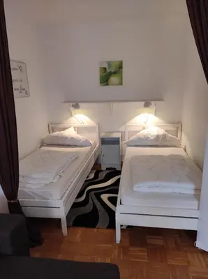 Ein Bett oder Betten in einem Zimmer der Unterkunft Günther`s Harzburg Stube