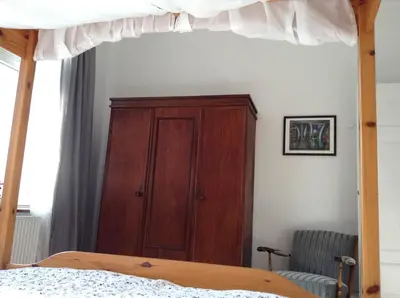 Ein Bett oder Betten in einem Zimmer der Unterkunft Wanderlust