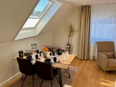 Ein Sitzbereich in der Unterkunft Haus-Holidayde Walkenried Harz Holiday 2 - a67281