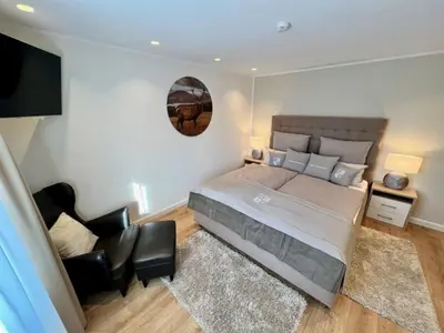 Ein Bett oder Betten in einem Zimmer der Unterkunft Haus-Holidayde Walkenried Harz Holiday 1 - a67282