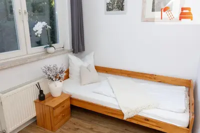 Ein Bett oder Betten in einem Zimmer der Unterkunft Pension Zum Hexenstieg