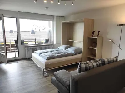 Ein Bett oder Betten in einem Zimmer der Unterkunft Ferienwohnung Hangblick