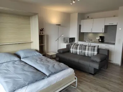 Ein Sitzbereich in der Unterkunft Ferienwohnung Hangblick