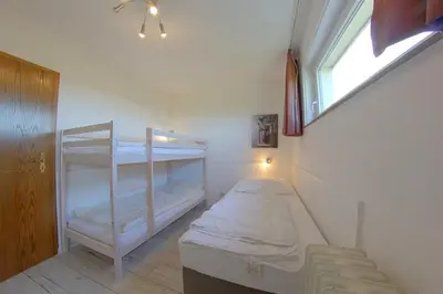 Ein Bett oder Betten in einem Zimmer der Unterkunft Apartment 340