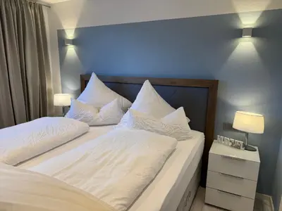 Ein Bett oder Betten in einem Zimmer der Unterkunft Ferienwohnungen Köhnke