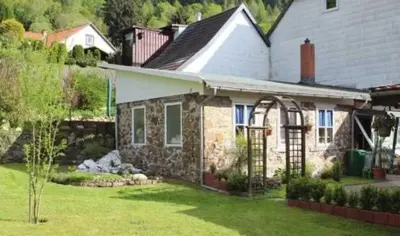 Ein Garten an der Unterkunft Haus Bergfried SORGENFREI BUCHEN