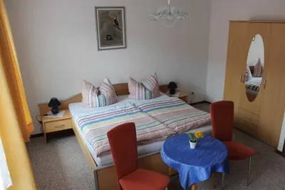Ein Bett oder Betten in einem Zimmer der Unterkunft Haus Bergfried SORGENFREI BUCHEN