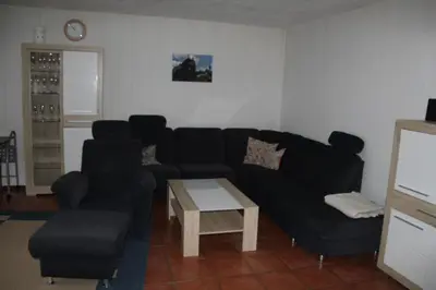 Ein Sitzbereich in der Unterkunft Ferienwohnung Waldwichtel