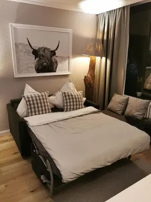 Ein Bett oder Betten in einem Zimmer der Unterkunft Seeblick am Kranichsee