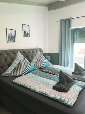 Ein Bett oder Betten in einem Zimmer der Unterkunft Ferienhaus Nicole II, Barrierefrei, mit HIRO Lift