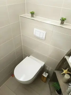 Ein Badezimmer in der Unterkunft Ferienhaus Nicole II, Barrierefrei, mit HIRO Lift