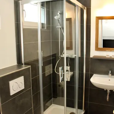 Ein Badezimmer in der Unterkunft The Lodge Bad Harzburg