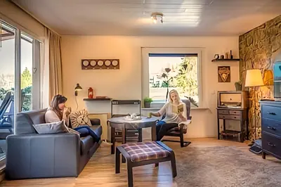 Ein Sitzbereich in der Unterkunft The Lodge Bad Harzburg