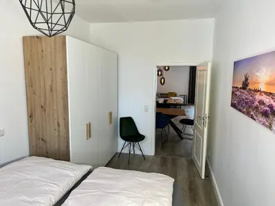 Ein Bett oder Betten in einem Zimmer der Unterkunft Ferienwohnungen Albarts by Mountain apart