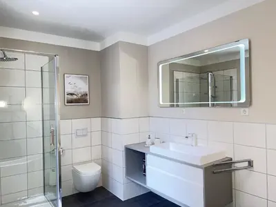 Ein Badezimmer in der Unterkunft Ferienwohnungen Albarts by Mountain apart