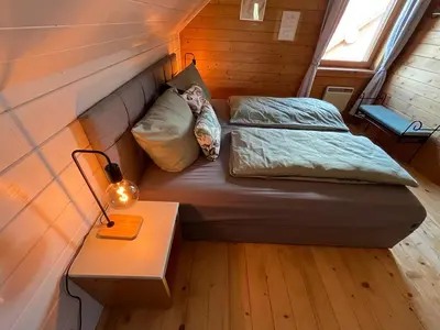 Ein Bett oder Betten in einem Zimmer der Unterkunft JS Feriendomizile Haus Sonnenschein Bettwäsche Handtücher inkl