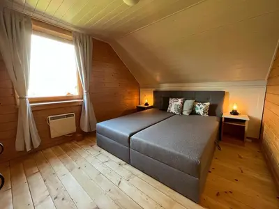Ein Bett oder Betten in einem Zimmer der Unterkunft JS Feriendomizile Haus Sonnenschein Bettwäsche Handtücher inkl