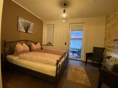 Ein Bett oder Betten in einem Zimmer der Unterkunft Ferienwohnung Heideviertel