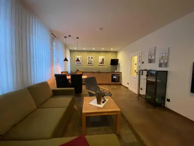 Ein Sitzbereich in der Unterkunft Ferienwohnung Heideviertel