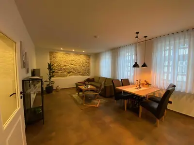 Ein Sitzbereich in der Unterkunft Ferienwohnung Heideviertel