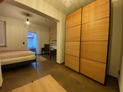 Ein Bett oder Betten in einem Zimmer der Unterkunft Ferienwohnung Heideviertel