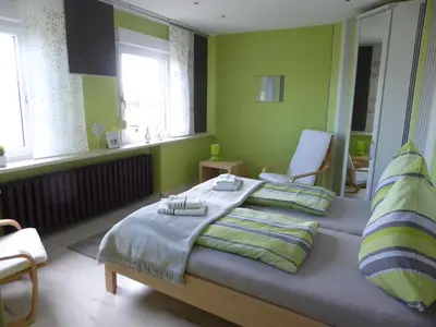 Ein Bett oder Betten in einem Zimmer der Unterkunft Ferienwohnung Hagebuttenweg