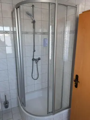 Ein Badezimmer in der Unterkunft Pension 