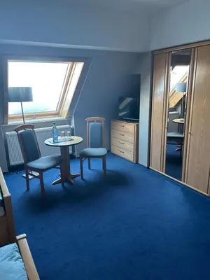 Ein Sitzbereich in der Unterkunft Pension 