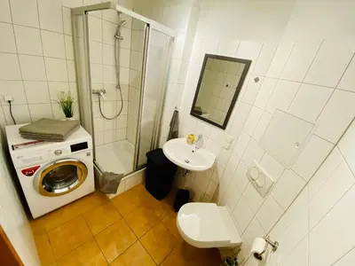 Ein Badezimmer in der Unterkunft FeWo Schlösschen #Innenstadt#Garten#ruhige Lage von Harztraveler