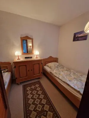 Ein Bett oder Betten in einem Zimmer der Unterkunft Urige Ferienwohnung Bocksbergblick Ferienpark Hahnenklee