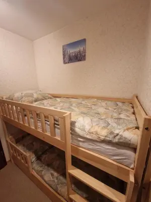 Ein Bett oder Betten in einem Zimmer der Unterkunft Urige Ferienwohnung Bocksbergblick Ferienpark Hahnenklee