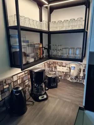 Ein Restaurant oder anderes Speiselokal in der Unterkunft Haus DeMa