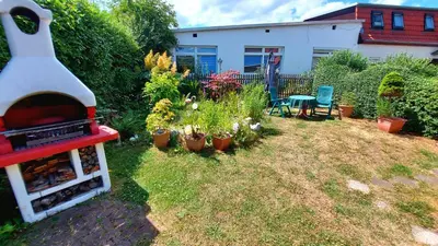 Ein Garten an der Unterkunft Rummy's Ferienwohnung mit Garten