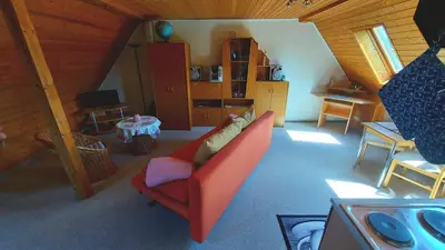 Ein Sitzbereich in der Unterkunft Rummy's Ferienwohnung mit Garten