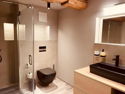 Ein Badezimmer in der Unterkunft FourElements
