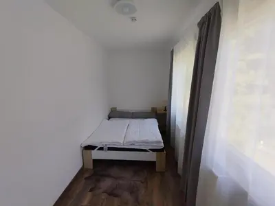 Ein Bett oder Betten in einem Zimmer der Unterkunft Haus am Wald Zorge 16+ Gäste