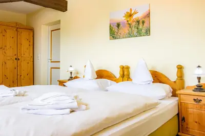 Ein Bett oder Betten in einem Zimmer der Unterkunft Hotel & Restaurant Brauner Hirsch Osterwieck