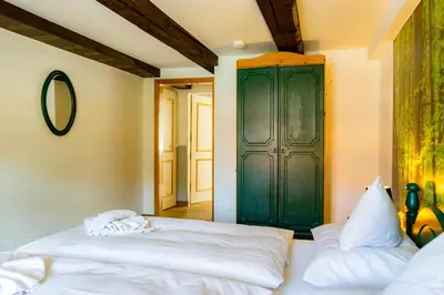 Ein Bett oder Betten in einem Zimmer der Unterkunft Hotel & Restaurant Brauner Hirsch Osterwieck