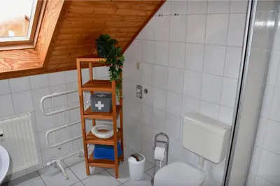 Ein Badezimmer in der Unterkunft Naturerlebnisdorf Blauvogel Hasselfelde
