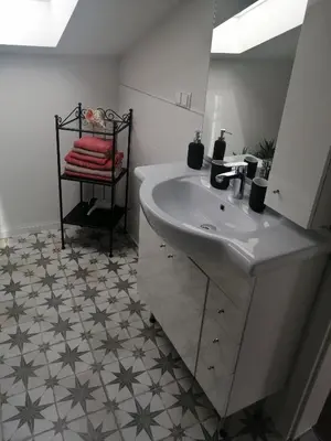 Ein Bett oder Betten in einem Zimmer der Unterkunft Ferienwohnung Am Stadtwald