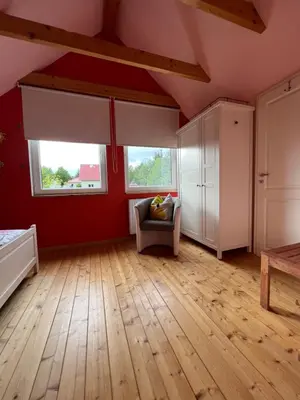 Ein Bett oder Betten in einem Zimmer der Unterkunft Haus Krönchen