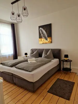 Ein Bett oder Betten in einem Zimmer der Unterkunft Zum Jakobi 4