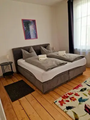 Ein Bett oder Betten in einem Zimmer der Unterkunft Zum Jakobi 4
