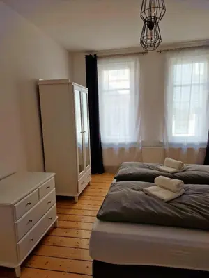 Ein Bett oder Betten in einem Zimmer der Unterkunft Zum Jakobi 4