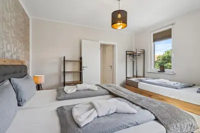 Ein Bett oder Betten in einem Zimmer der Unterkunft Harztanne - Rückzugsort mit Grill & Parkplatz