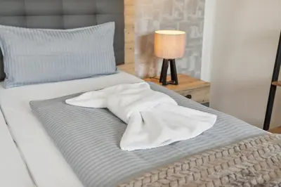 Ein Bett oder Betten in einem Zimmer der Unterkunft Harztanne - Rückzugsort mit Grill & Parkplatz