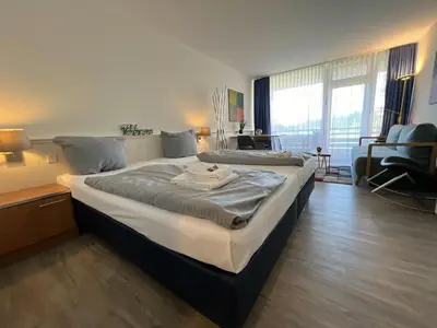 Ein Bett oder Betten in einem Zimmer der Unterkunft Haus am See HS 715 S