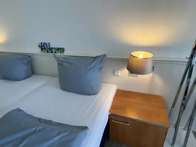 Ein Bett oder Betten in einem Zimmer der Unterkunft Haus am See HS 715 S