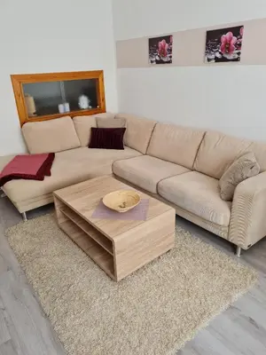 Ein Sitzbereich in der Unterkunft Ferienwohnung Sattlerbad