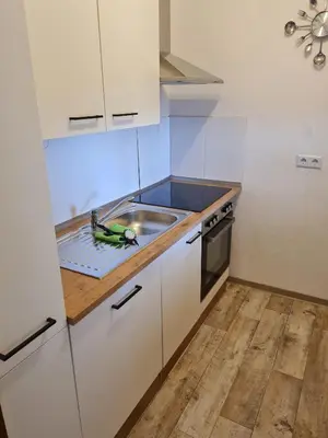 Küche/Küchenzeile in der Unterkunft Ferienwohnung Sattlerbad